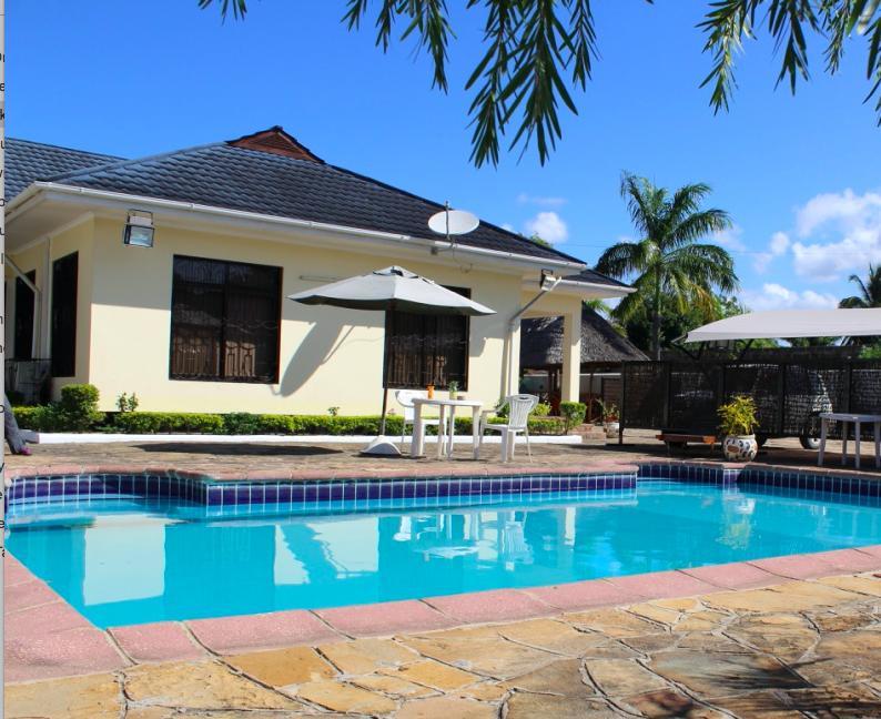 Idc Guest House Bagamoyo Esterno foto